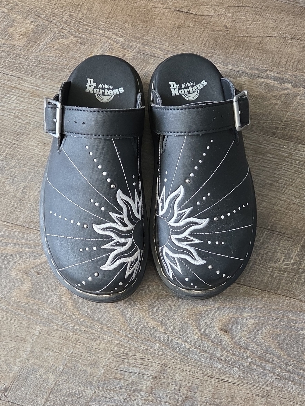 Dr. Martens Black Clog Sandals with White Sun Embroidery